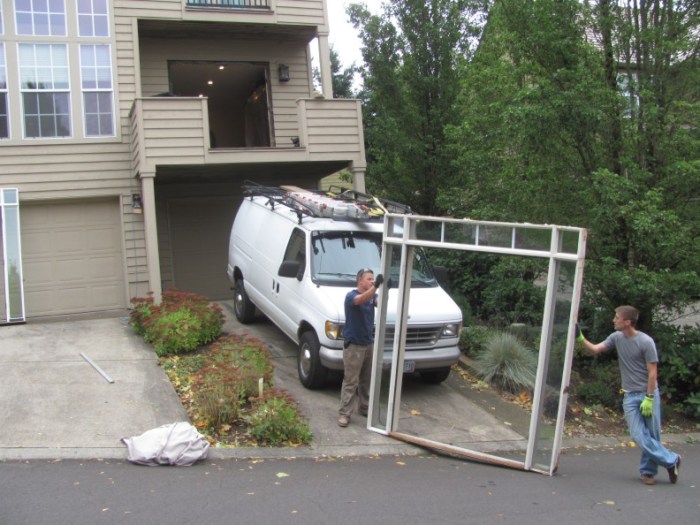 Cost to replace front door with sidelights and transom